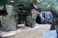 the inside of a cave with rock formations