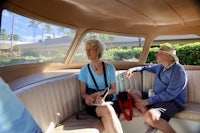 a man and woman sitting in a boat