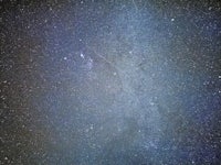 an image of the milky in the night sky